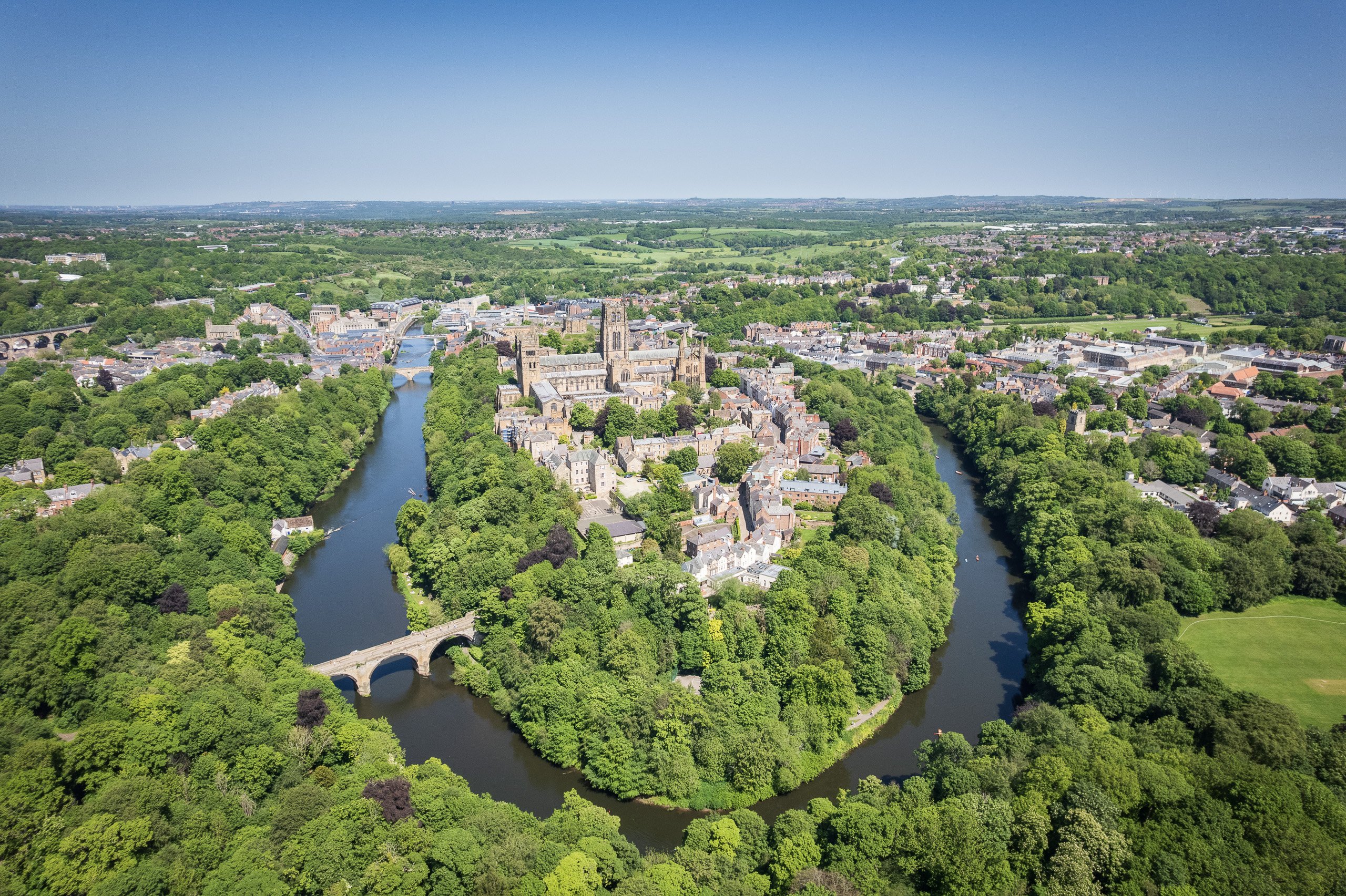 Aerial view of Durham Cathedral above a bend in the River Wear