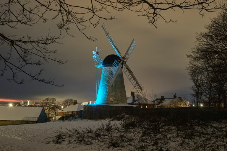 Fulwell Windmill lit blue in snow, Fulwell, Sunderland - December, Sunderland Calendar 2027